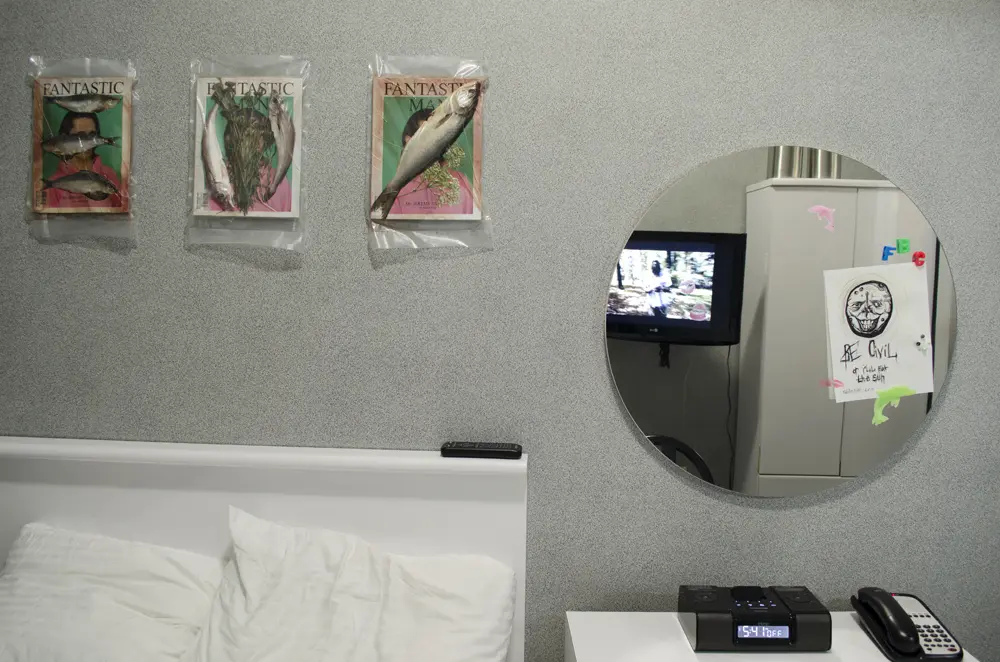 Cultural Affair installation view over the hotel bed