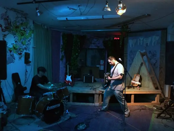 Live guitar performance during Trade in Trade Up